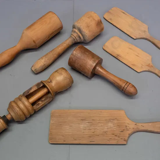 assorted vintage wooden kitchenalia - butter paddles, 3 mallets, some kind of telescoping pitter or press - age wear,