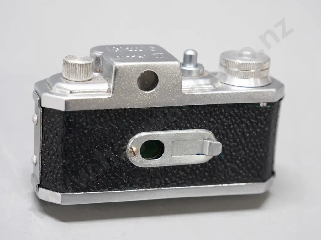 vintage Japanese "Kiku 16 Model II" miniature camera with leather case. Has take-up spool, shutter fires intermittently, Image 1++