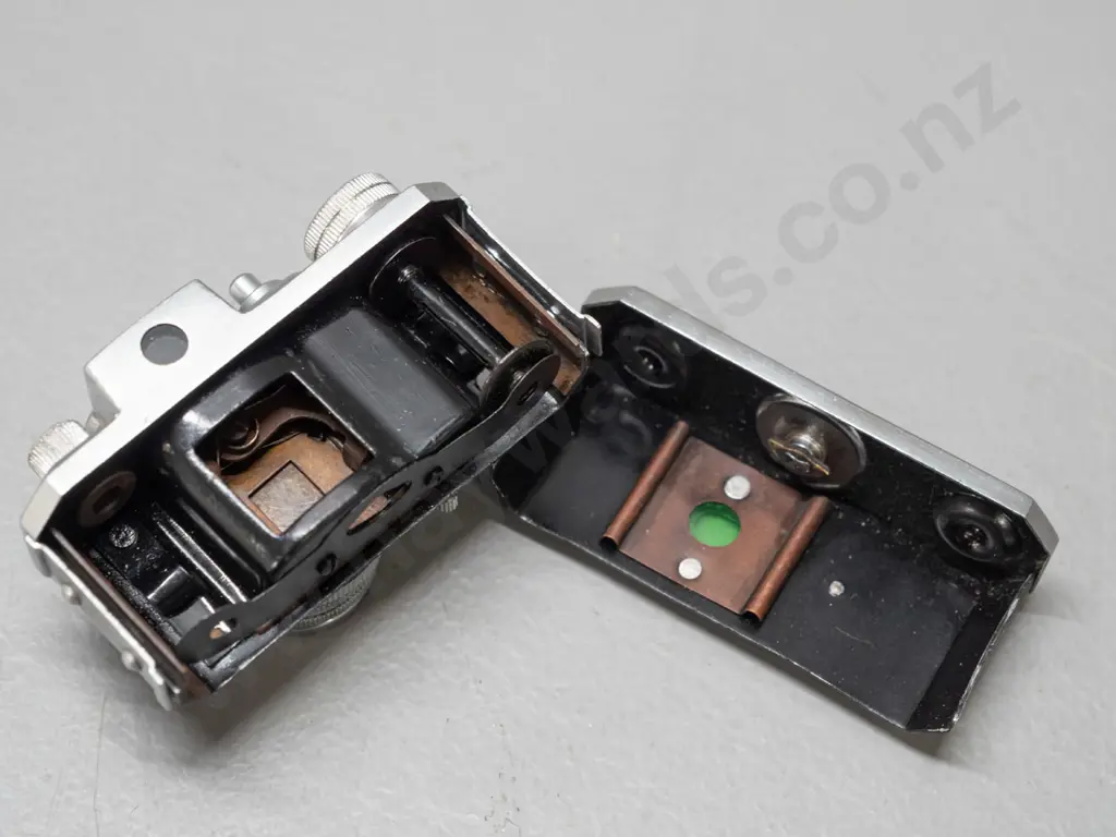 vintage Japanese "Kiku 16 Model II" miniature camera with leather case. Has take-up spool, shutter fires intermittently, Image 1++