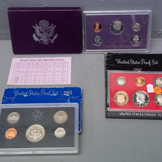 3 cased and boxed United States uncirculated proof coins sets - 1982, 83 and 87 - some wear to boxes