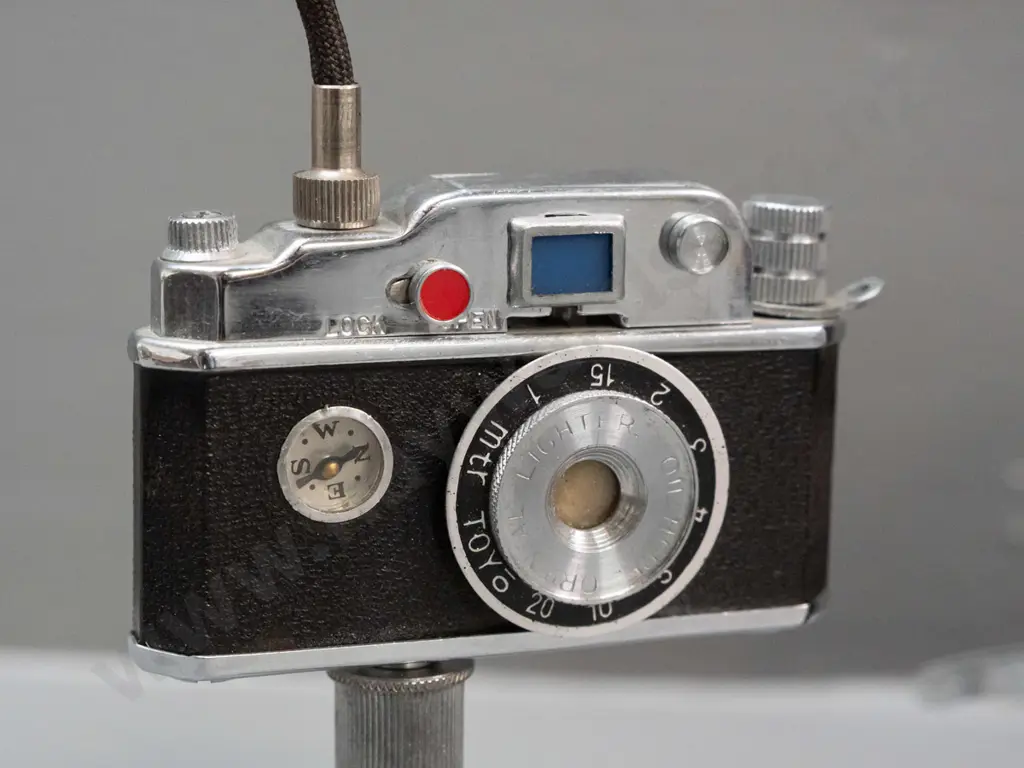 vintage wind-up Smiths interval timer and novelty lighter in form of a camera on mini tripod - not sure if mechanism is Image 1++