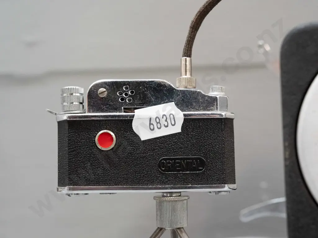 vintage wind-up Smiths interval timer and novelty lighter in form of a camera on mini tripod - not sure if mechanism is Image 1++