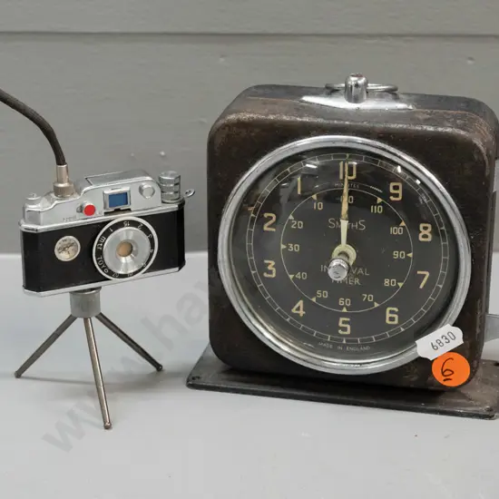 vintage wind-up Smiths interval timer and novelty lighter in form of a camera on mini tripod - not sure if mechanism is