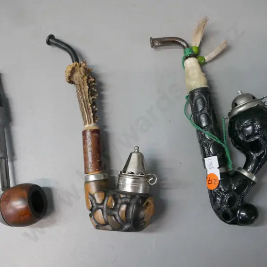 3x smokers pipes: 2x carved wood w/ metal-hinged cap fittings, faux bone & antler inserts etc. & one other. L-200