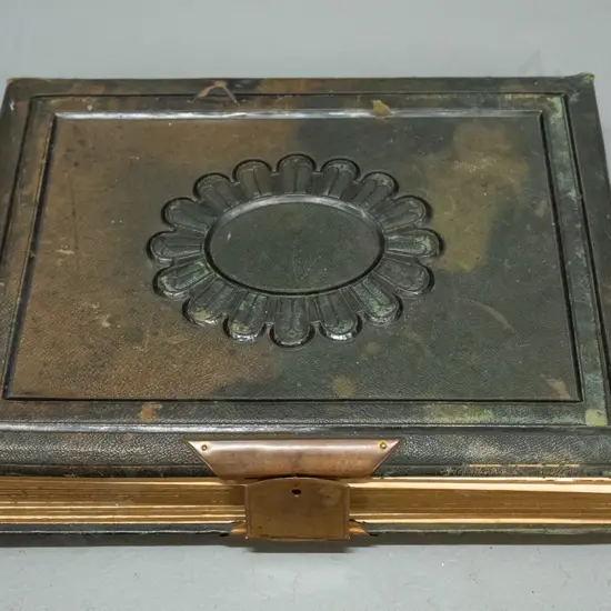 antique embossed leather photo album with brass fittings - contents appear to be English subjects and studios - some