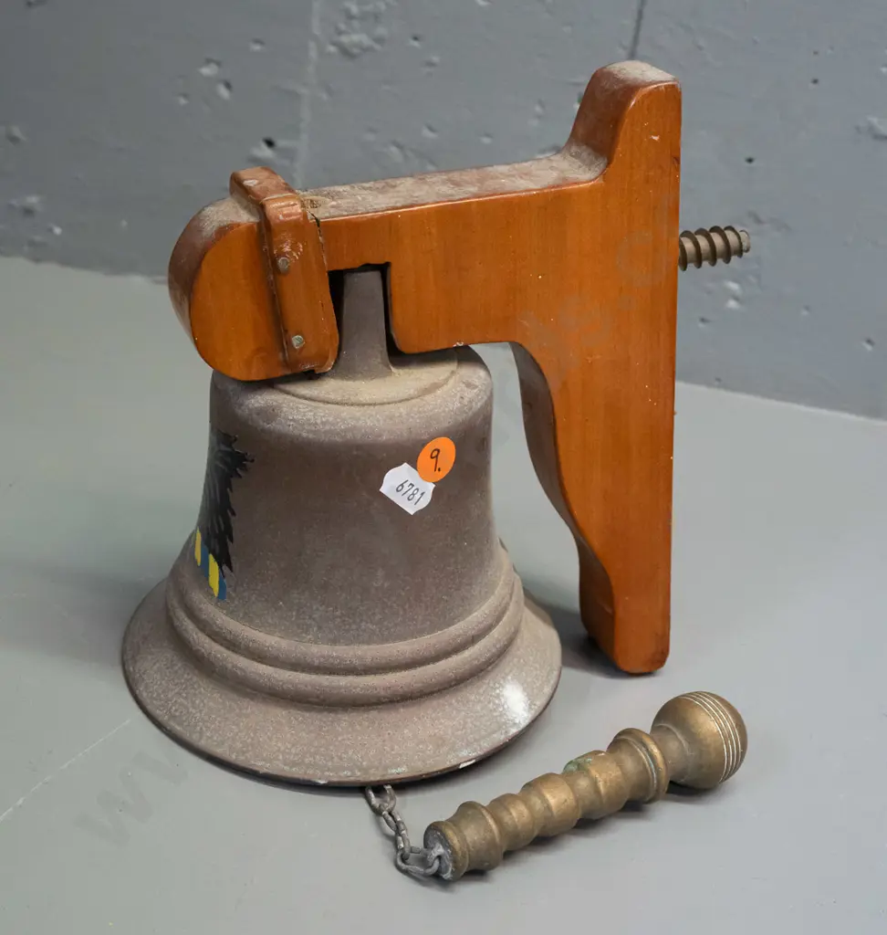 Cast metal wall-mount school bell w/ wooden wall bracket heavy cast handle painted wolf logo. Bell H-140 D-145 [some age Image 1++