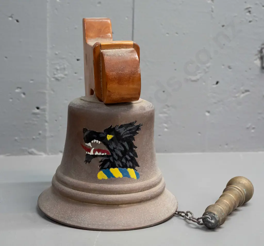 Cast metal wall-mount school bell w/ wooden wall bracket heavy cast handle painted wolf logo. Bell H-140 D-145 [some age Image 1++