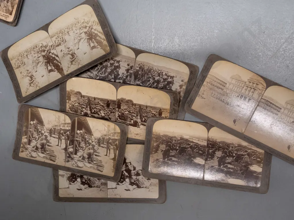 Underwood & Underwood stereoscope viewer and numerous cards including Boer War scenes, European cities, novelty parlour Image 1++