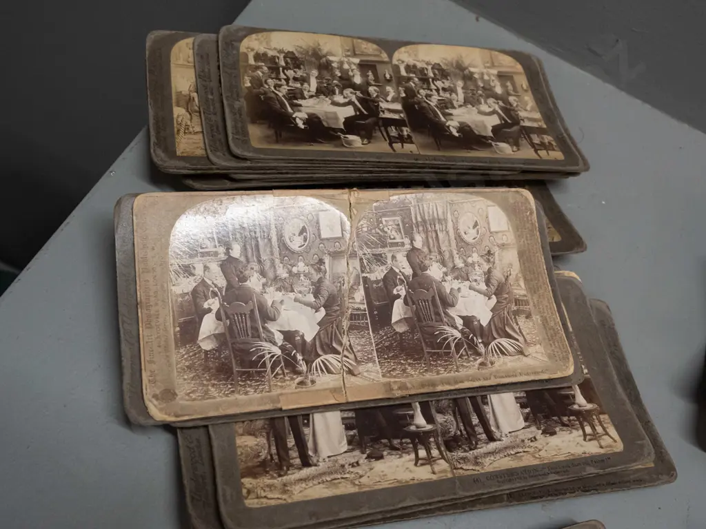 Underwood & Underwood stereoscope viewer and numerous cards including Boer War scenes, European cities, novelty parlour Image 1++