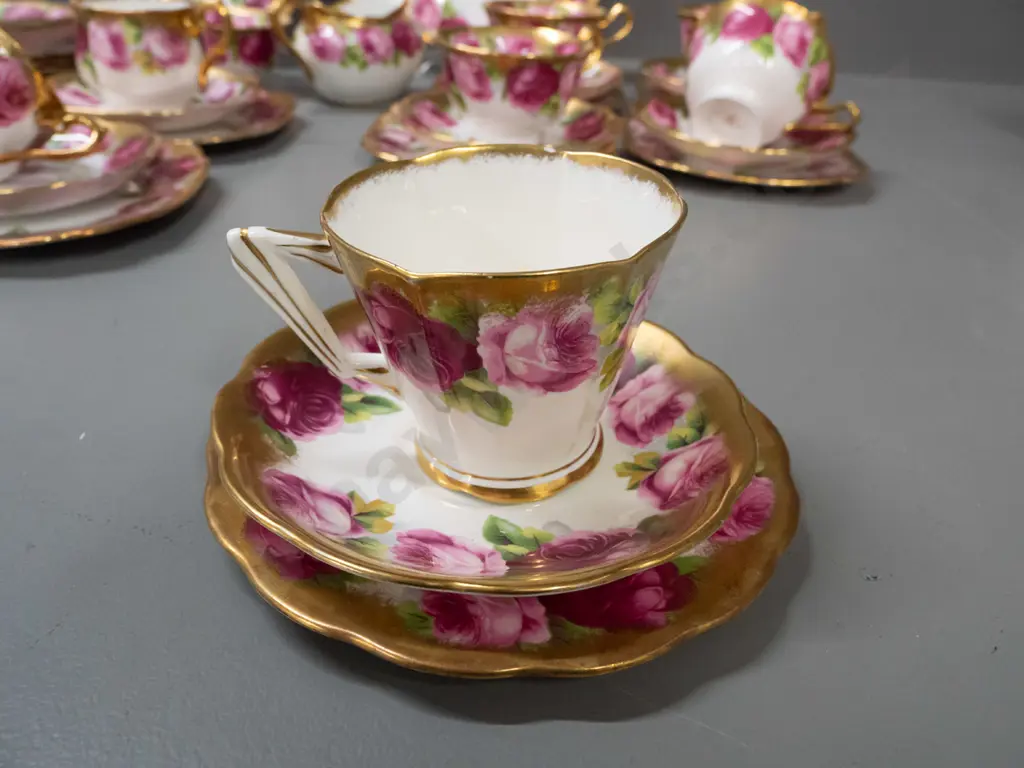 Royal Albert heavily gilded Old English Rose tea ware: 9 trios in 3 shapes, cream, sugar, 2 cake plates, 2 spare saucers Image 1++