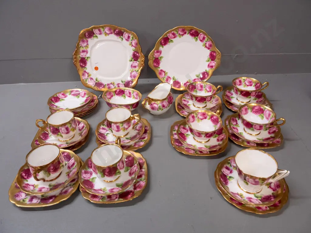 Royal Albert heavily gilded Old English Rose tea ware: 9 trios in 3 shapes, cream, sugar, 2 cake plates, 2 spare saucers Image 1++