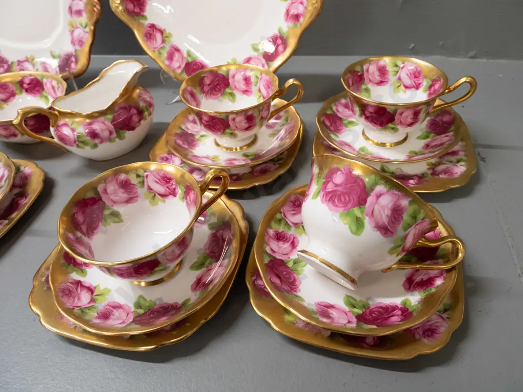 Royal Albert heavily gilded Old English Rose tea ware: 9 trios in 3 shapes, cream, sugar, 2 cake plates, 2 spare saucers Image 1++