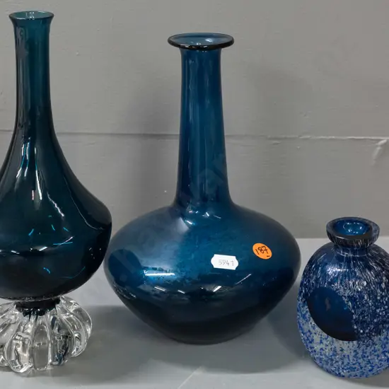 3 blue art glass items - small textured vase with one polished face, 2 bottle vases, one with lobed clear base H-240,