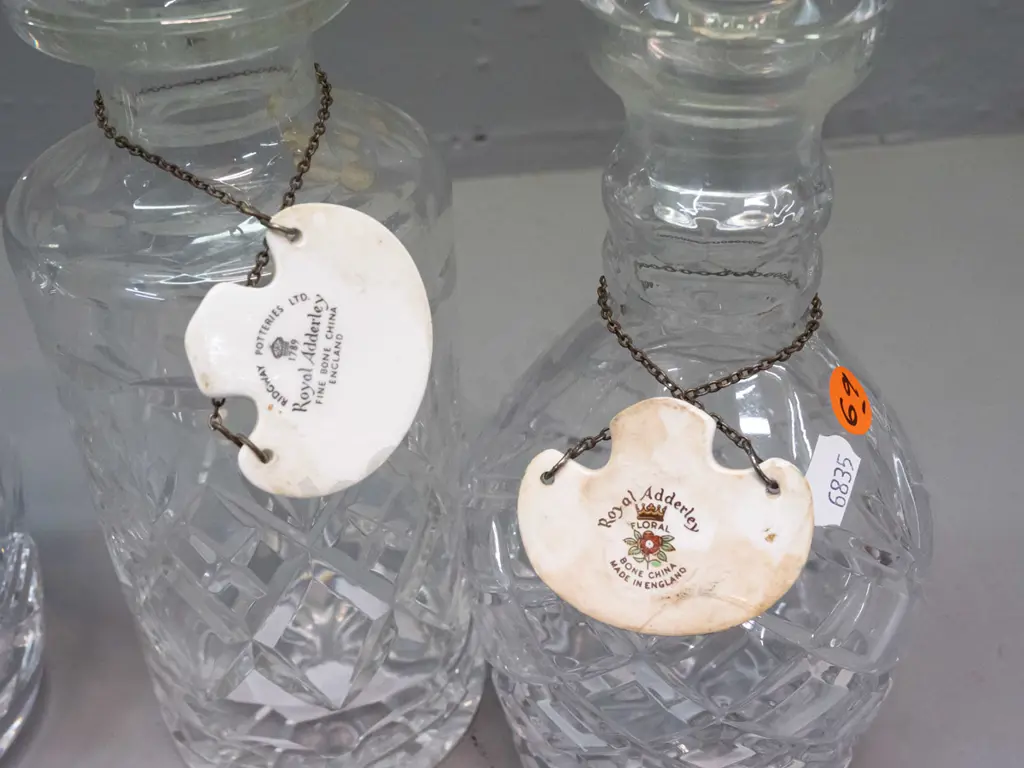3 cut crystal stoppered decanters and 2 Royal Adderley / Ridgway "Gin" and "Brandy" porcelain labels - tallest is H-290 Image 1++