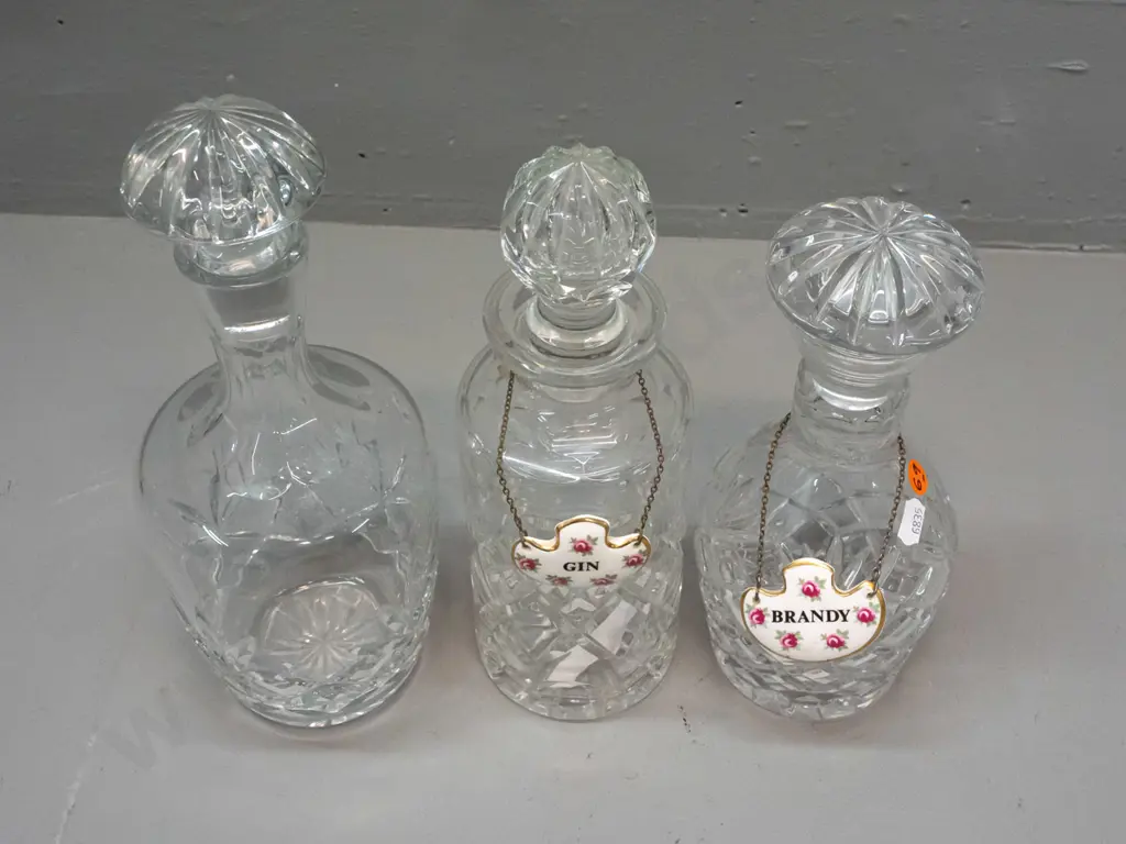 3 cut crystal stoppered decanters and 2 Royal Adderley / Ridgway "Gin" and "Brandy" porcelain labels - tallest is H-290 Image 1++