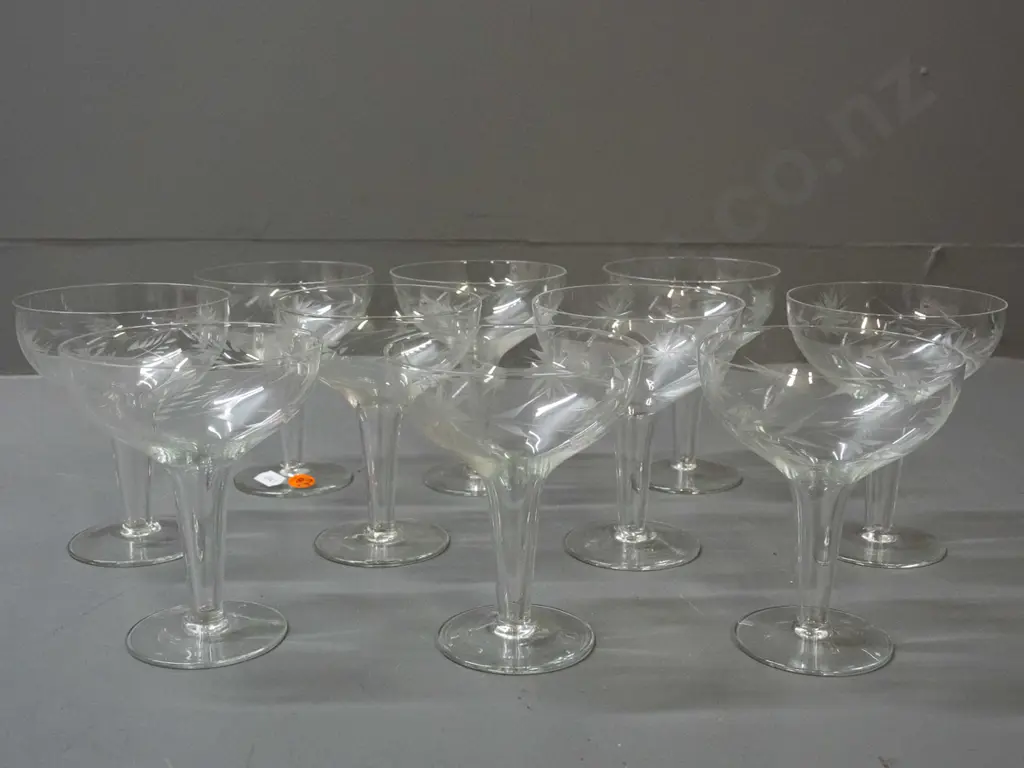 10 hollow-stemmed champagne glasses with matching etched foliate motifs - one has some fretting around rim H-115 D-90 Image 1++