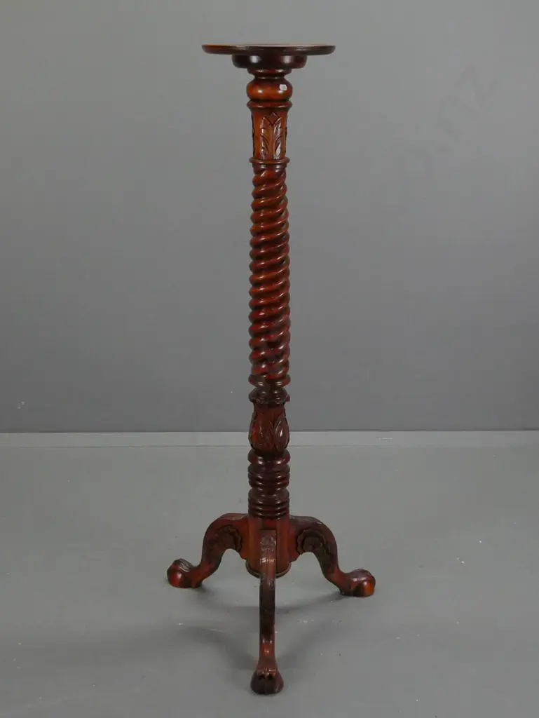 traditional style Indonesian mahogany twist column and foliate carved torchiere or plant stand with 3 carved legs on Image 1++