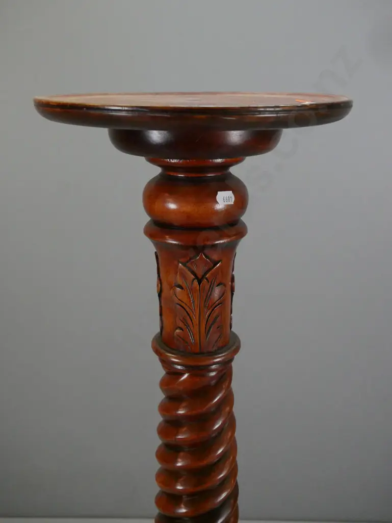 traditional style Indonesian mahogany twist column and foliate carved torchiere or plant stand with 3 carved legs on Image 1++