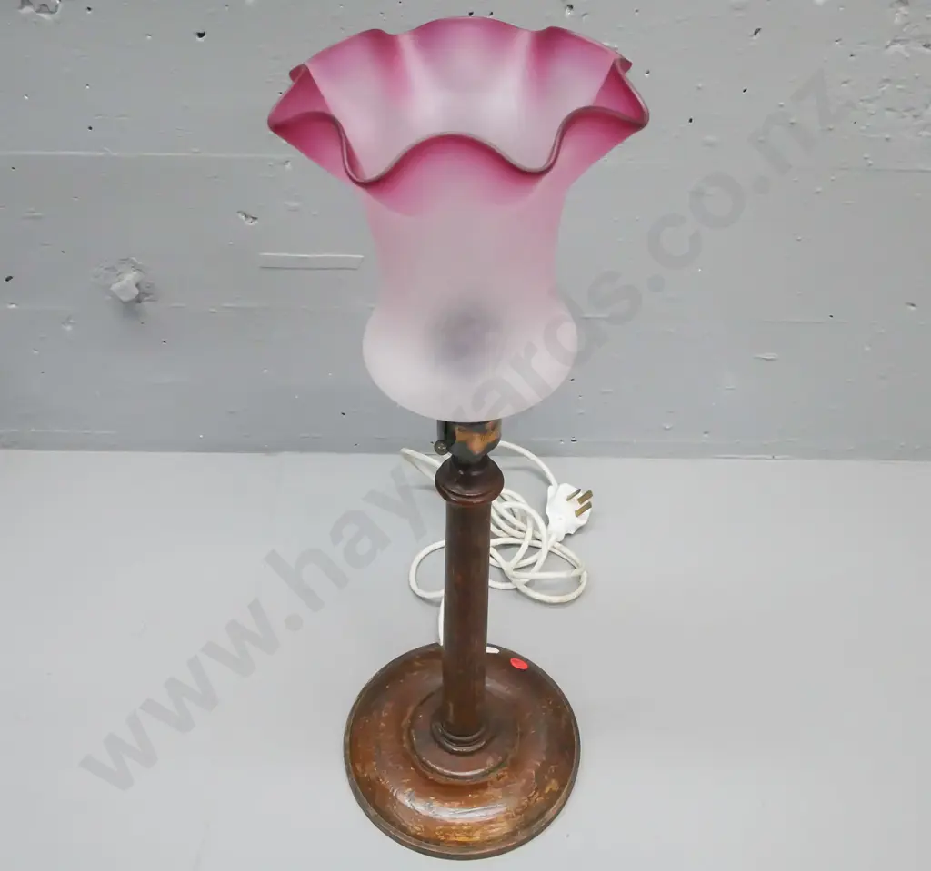 vintage oak table lamp, circular base on turned tapered column, frosted and fluted shade white grading to cranberry. Image 1++