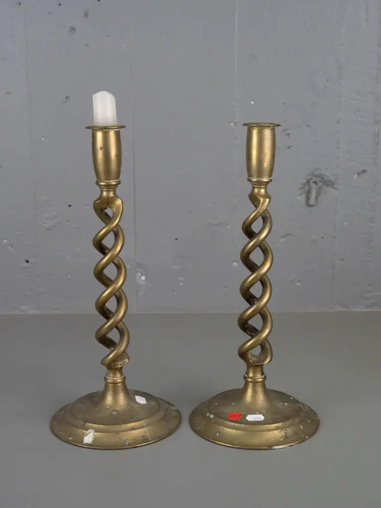 pair of Victorian brass open twist candlesticks on circular base. Discolouration to brass, wax staining. H-310 D-135 Image 1++