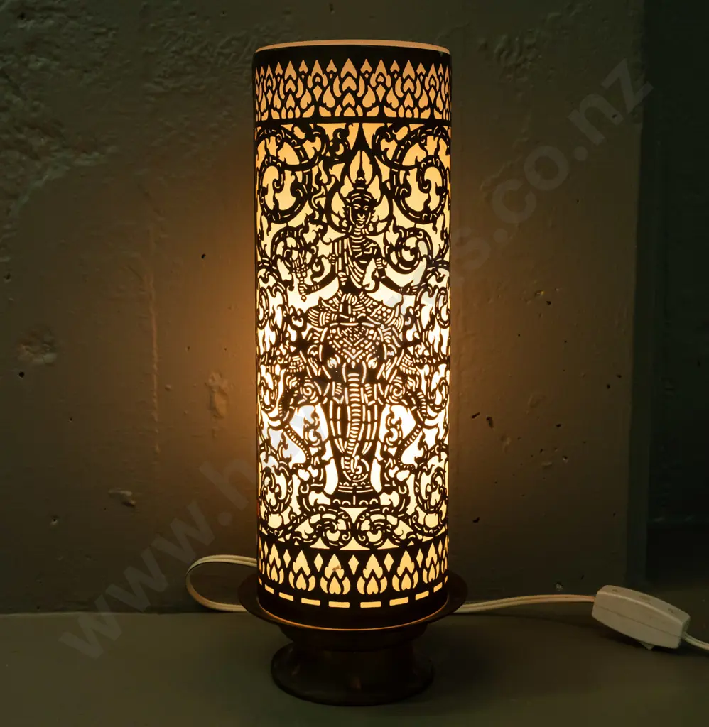 cylindrical pierced brass table lamp with frosted glass shade, on spun brass base - Thai or Indian motifs - some dents Image 1++