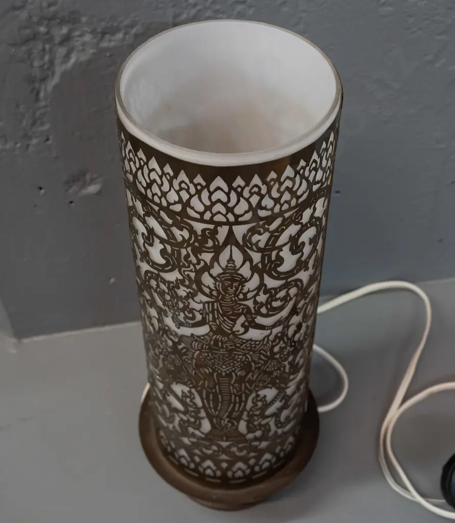 cylindrical pierced brass table lamp with frosted glass shade, on spun brass base - Thai or Indian motifs - some dents Image 1++