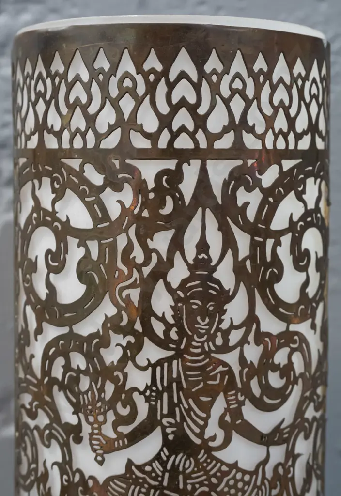cylindrical pierced brass table lamp with frosted glass shade, on spun brass base - Thai or Indian motifs - some dents Image 1++