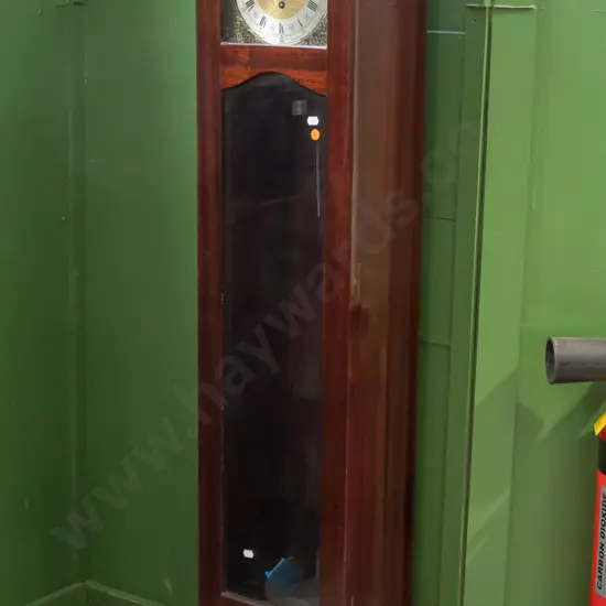 reproduction mahogany free-standing clock w/ glazed bevel-edged arched-top door brass arch-top face silver band
