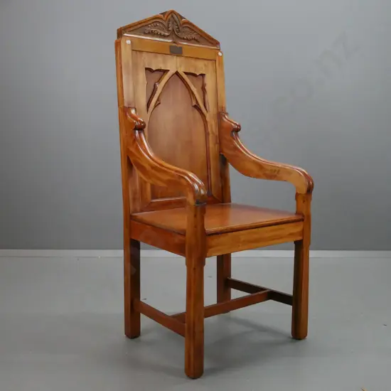 vintage beech & rimu ecclesiastical gothic style open-armed chair with panelled tracery back, carved top crest,