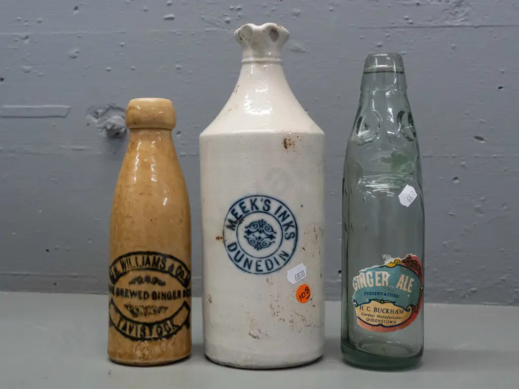 3 vintage bottles - Buckham Queenstown ginger ale marble bottle with part label, Meek's Inks Dunedin stoneware (chip in Image 1++