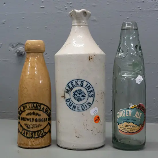 3 vintage bottles - Buckham Queenstown ginger ale marble bottle with part label, Meek's Inks Dunedin stoneware (chip in