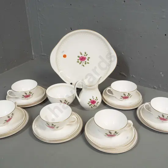Royal Doulton "Sweetheart Rose" 21-piece tea set - cake plate, 6 trios, cream & sugar - 1 cup has crack. Cake plate W260