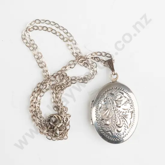 silver locket stamped sterling