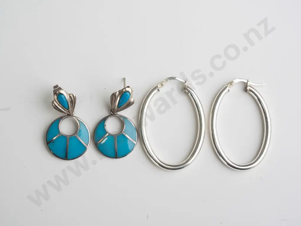 pair of silver hoop earrings stamped 925 & pair of blue/silver earrings stamped 925 on butterfly Image 1++