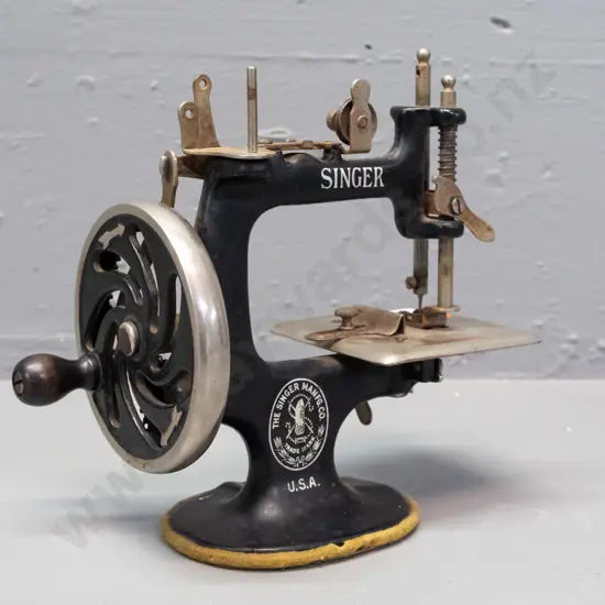miniature toy Singer hand-crank sewing machine, marked Singer USA - seems to be functioning H-150 L-170