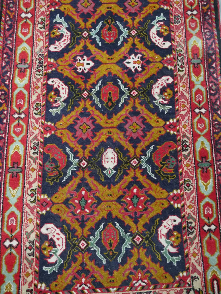 asian style wool floor runner with organic motifs in red, blue, teal and mustard tones - some wear. L-3200 W-800 Image 1++
