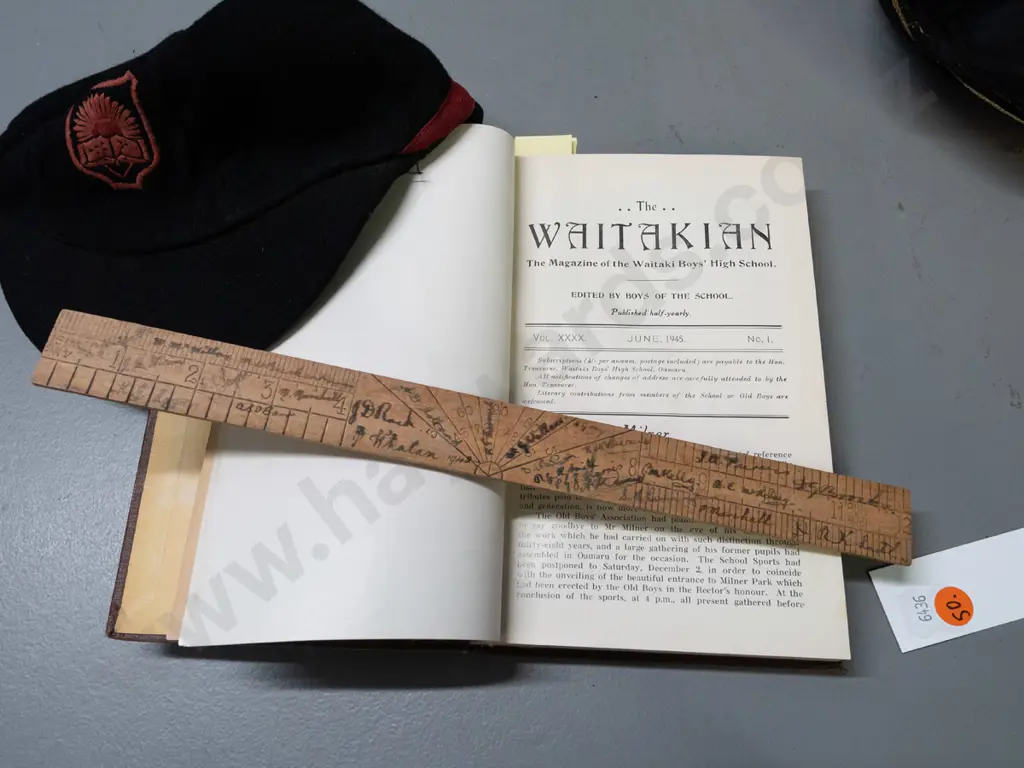 Assortment of Waitaki Boys High School memorabilia: scarf, ties, banner, bound volume of 'The Waitakian', signed wooden Image 1++