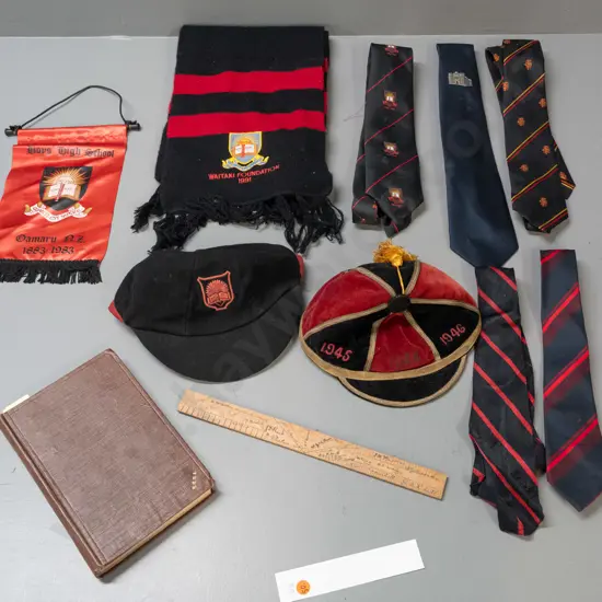 Assortment of Waitaki Boys High School memorabilia: scarf, ties, banner, bound volume of 'The Waitakian', signed wooden