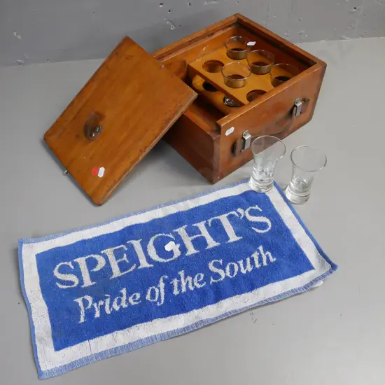 Speights tour presentation box & glasses. Cedar box w/ sliding lid exposing 6x flight glasses in kauri stand, bar mat.