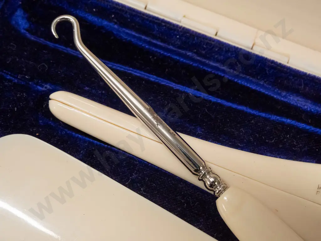 vintage English ivorine dressing table set - shoe horn, button hook and glove stretcher in hinged lid box - small crack Image 1++