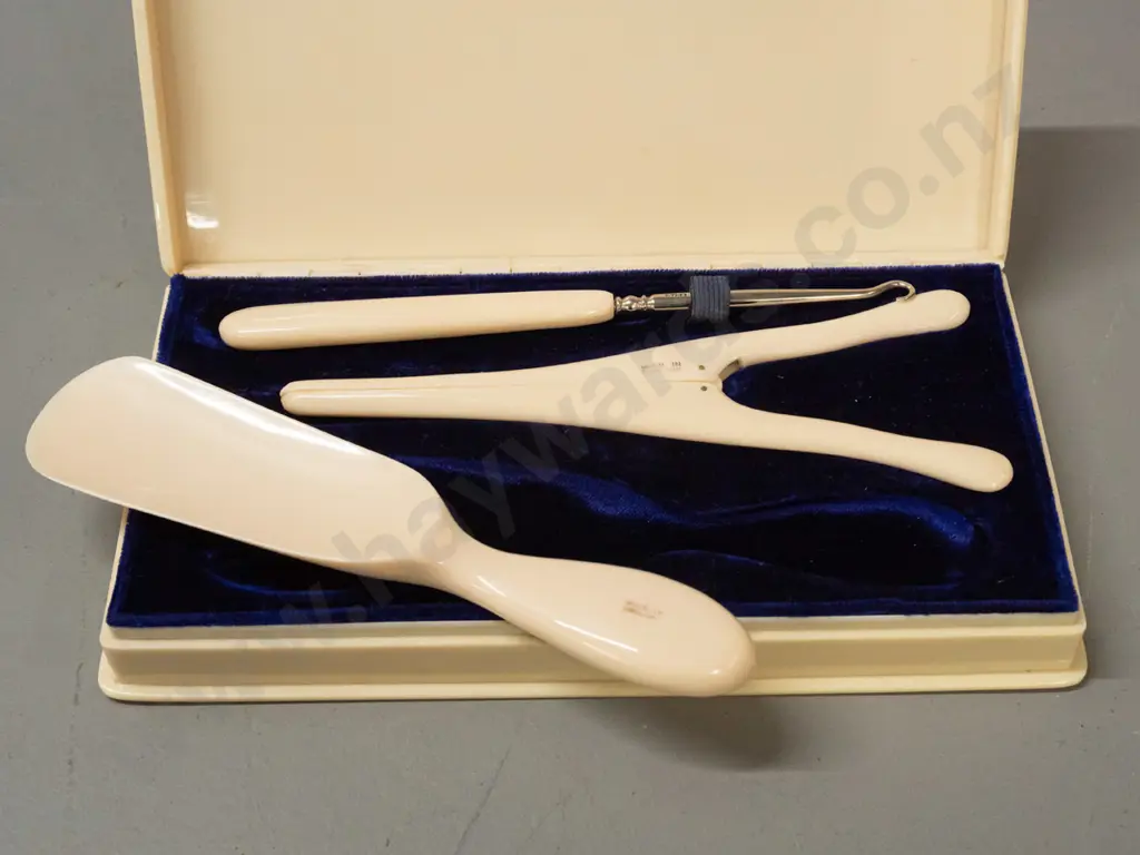vintage English ivorine dressing table set - shoe horn, button hook and glove stretcher in hinged lid box - small crack Image 1++