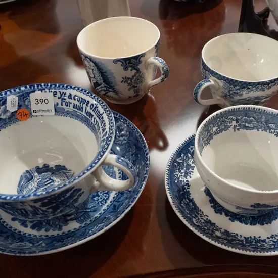 4 breakfast cups, 2 with saucers, one oversized - see photos for detail. Largest cup H-90 W-190.