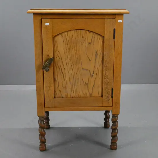 vintage oak bedside table with panelled door, on Jacobean twist legs - drop handle is loose due to missing back latch