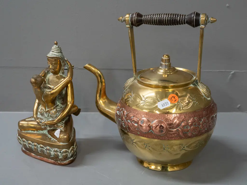 brass teapot with turned wood handle, band of pressed copper decoration, brass-plated lid, and brass erotic figure with Image 1++