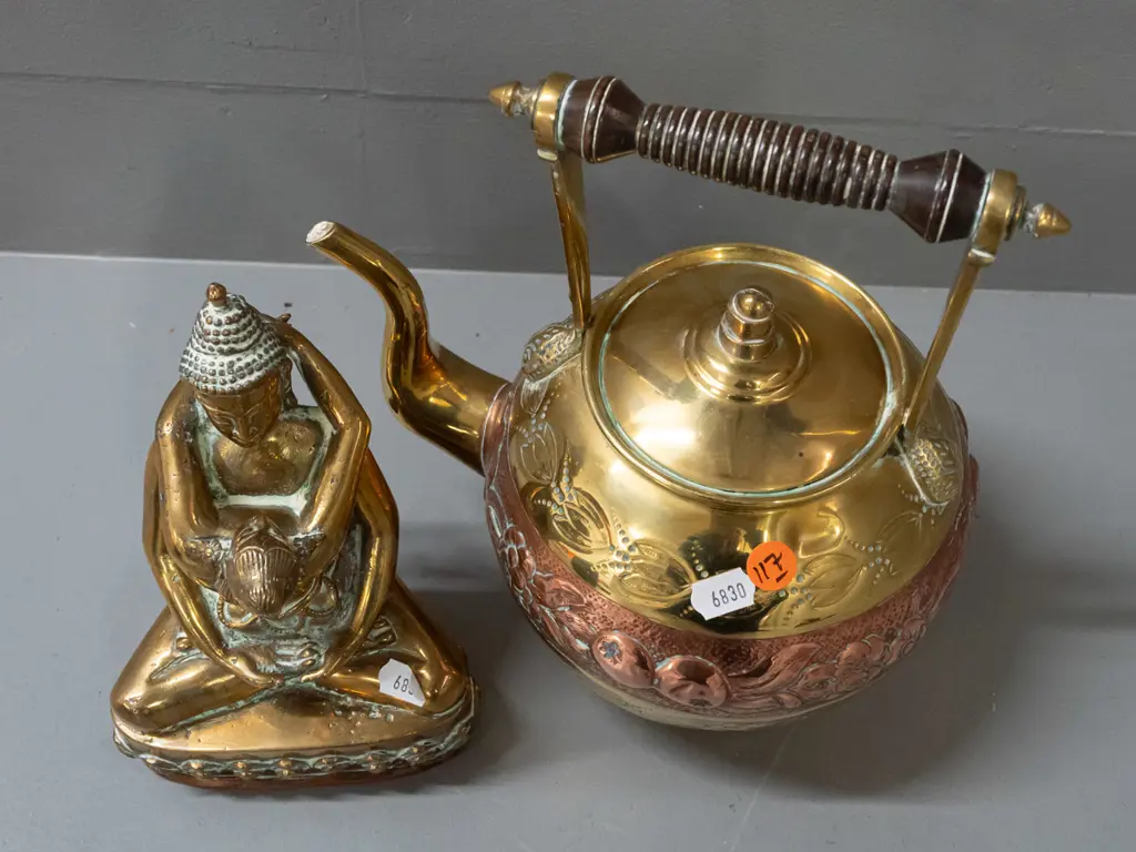 brass teapot with turned wood handle, band of pressed copper decoration, brass-plated lid, and brass erotic figure with Image 1++