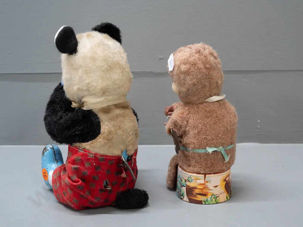 2 vintage wind-up toys - monkey with scrubbing brush, missing other hand - and a Panda pouring a drink - monkey marked Image 1++