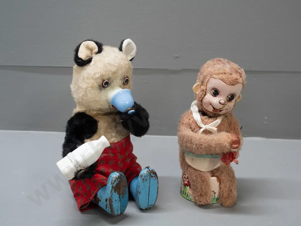 2 vintage wind-up toys - monkey with scrubbing brush, missing other hand - and a Panda pouring a drink - monkey marked Image 1++