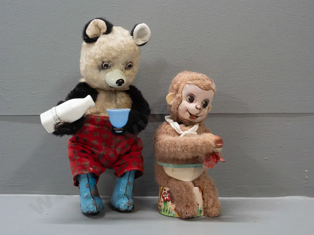 2 vintage wind-up toys - monkey with scrubbing brush, missing other hand - and a Panda pouring a drink - monkey marked Image 1++