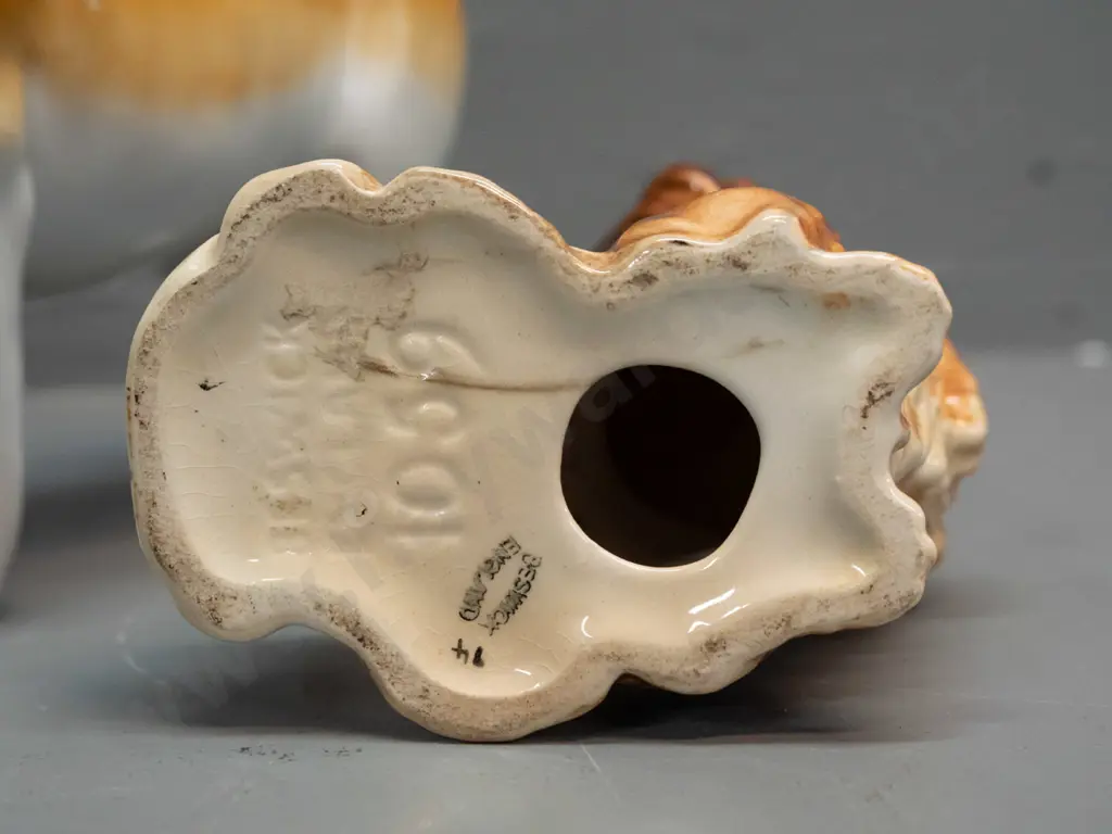 2 dog figures - Beswick begging Pekinese H-120 and a vintage pug, no maker's marks H-165 L-180. Pug has minor chipping Image 1++