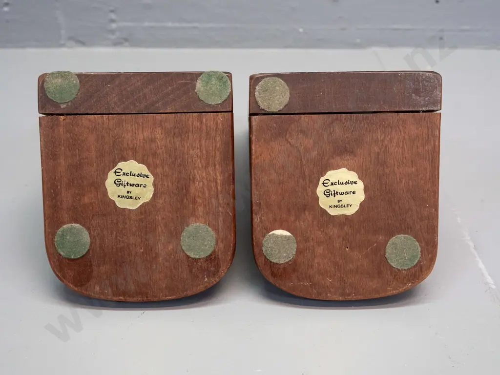 pair of Maori themed (mahogany?) timber book ends with applied cast copper-finish decoration - label on base: Exclusive Image 1++
